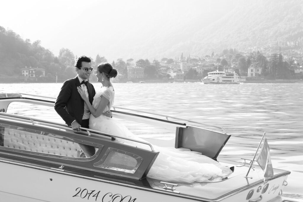 Destination elopement wedding on a vintage cigarette boat in Lake Como