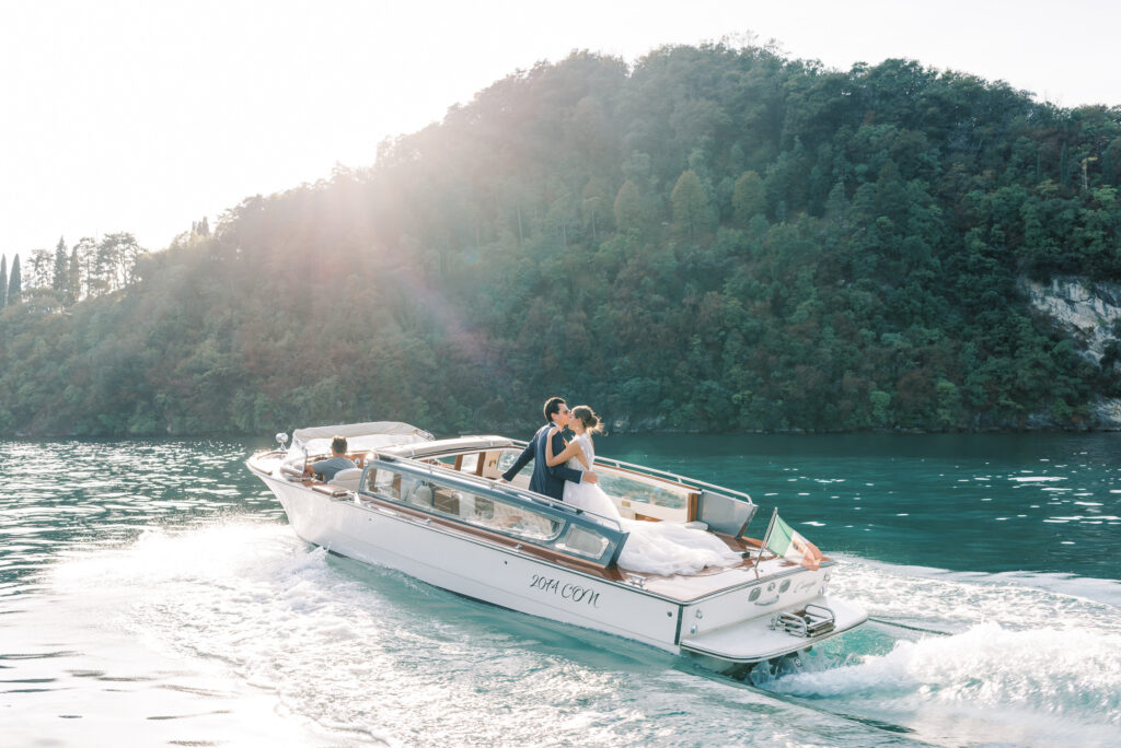 Wedding couple on a private boat tour with Lake Como water taxis